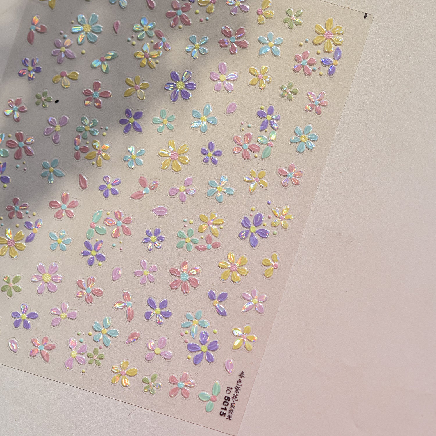 Sheet of colorful flower-shaped stickers 