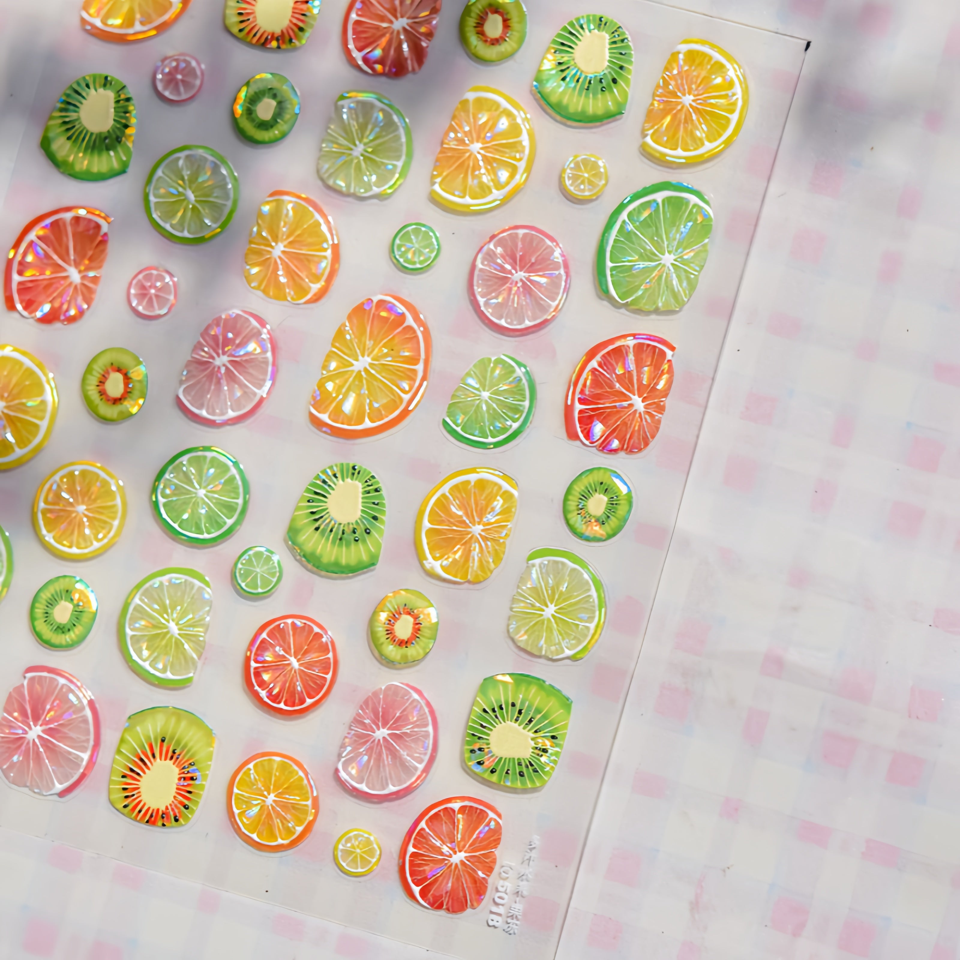 Sheet of colorful fruit slice nail stickers 