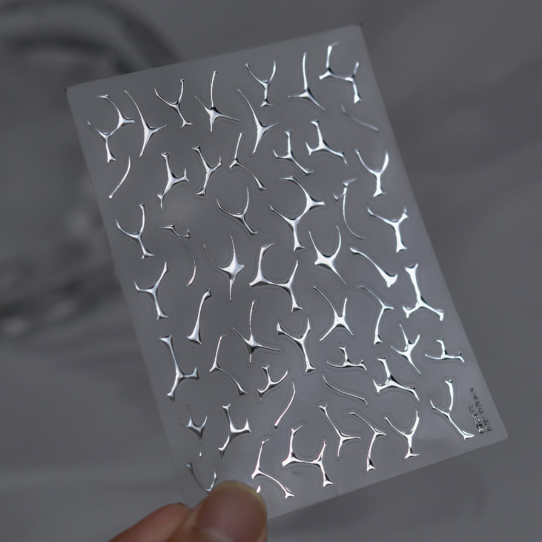 Nail stickes sheet with intricate Silver pattern