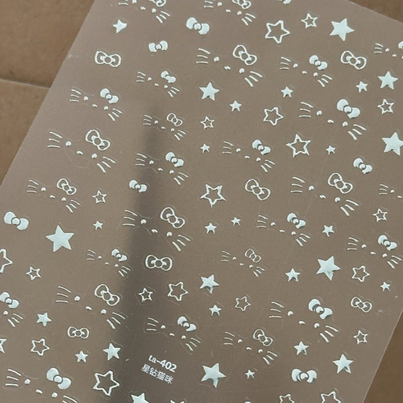 Nail stickers sheet with Silver star and bow and cat design
